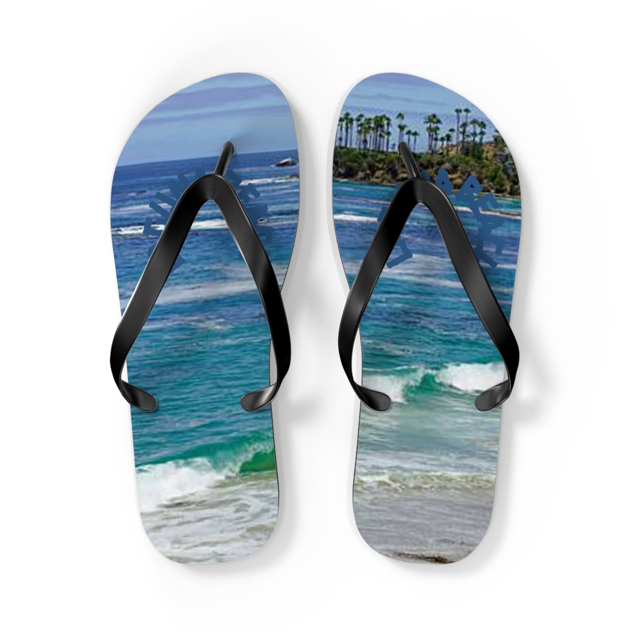 Flip-flops with a beach scene featuring ocean waves and palm trees.