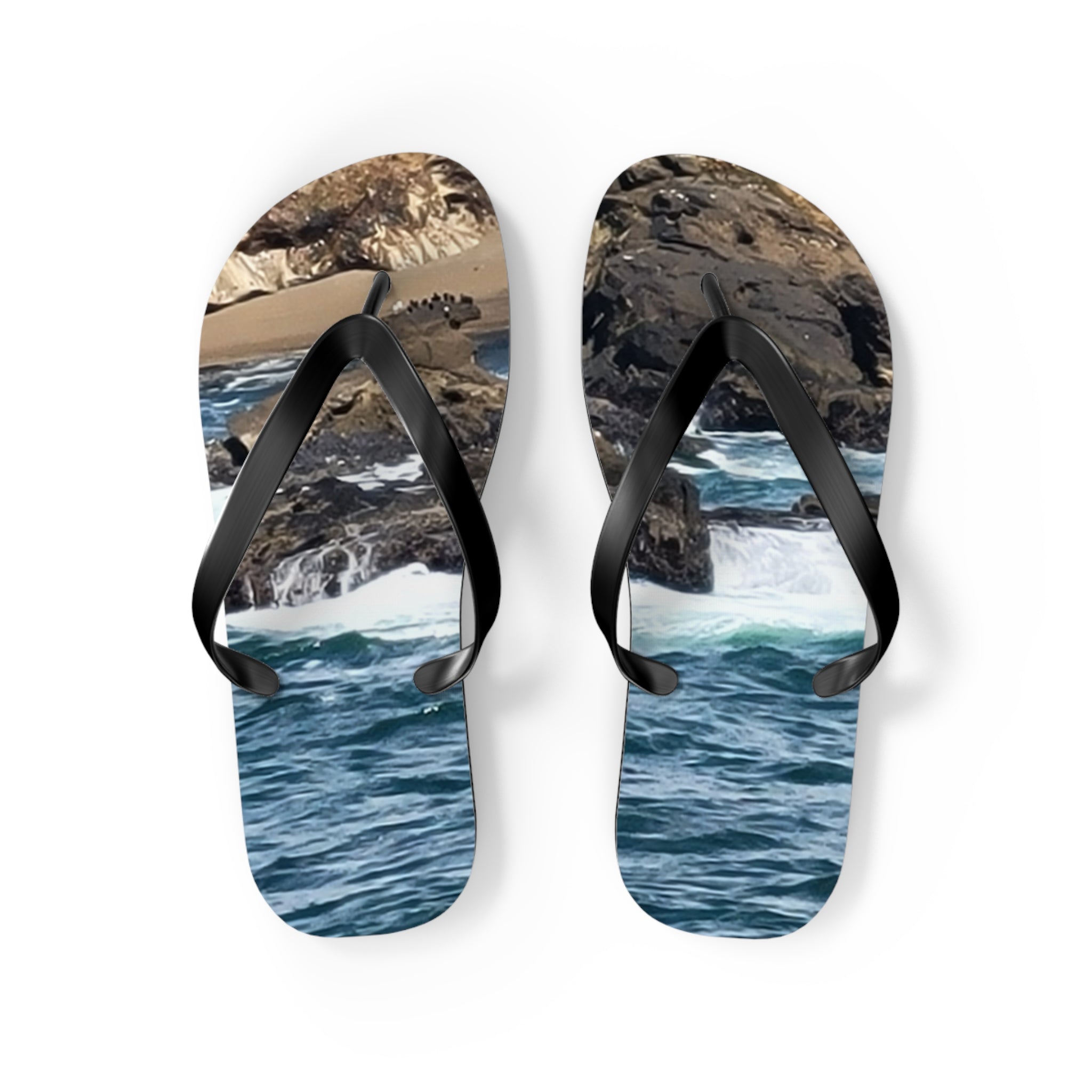 Flip-flops with ocean waves and rocky shoreline design.