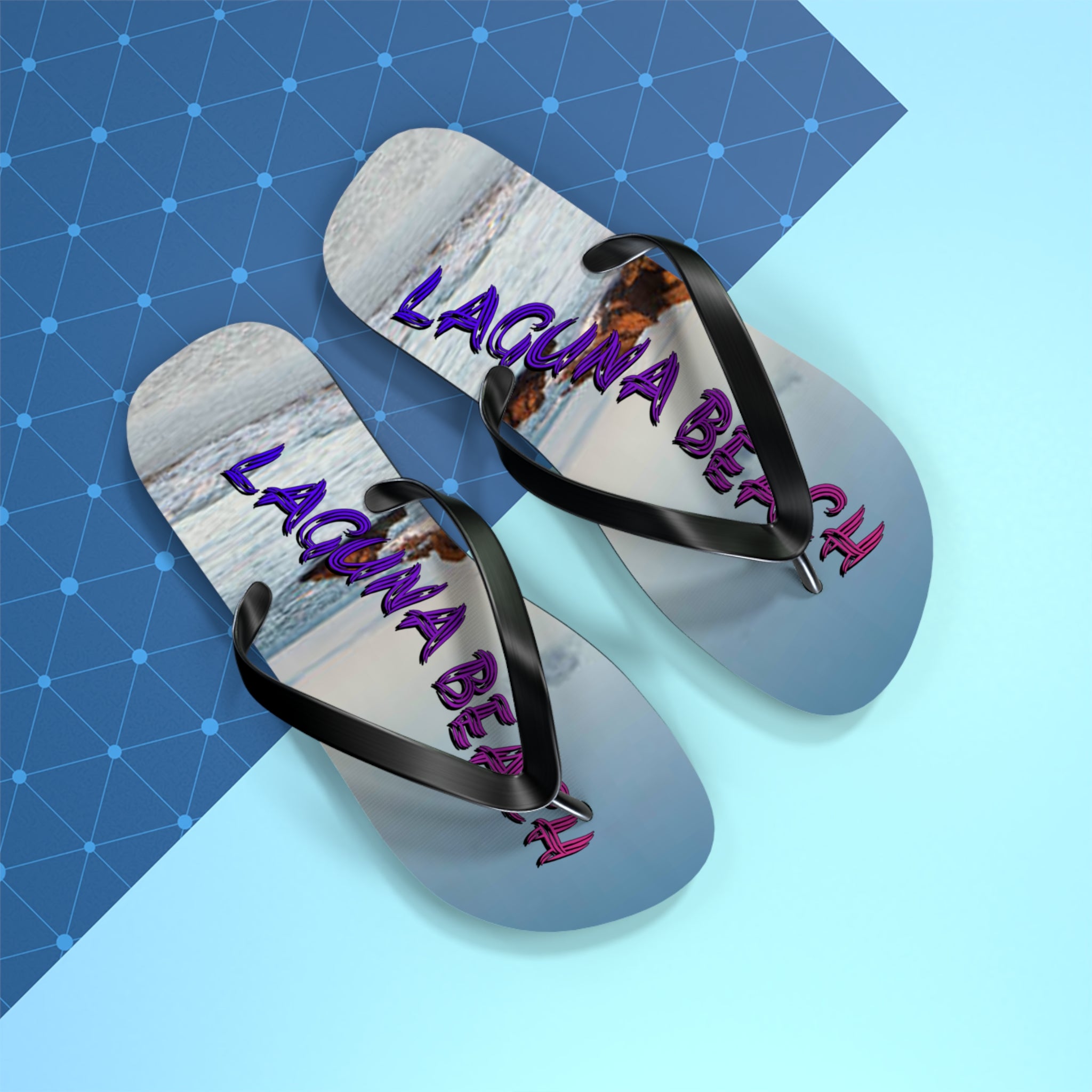 Flip-flops with "LAGUNA BEACH" text against a blue geometric background.