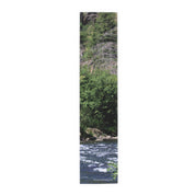 Fabric banner with water, trees, and "JROSEATTIONFINDS.COM" text.