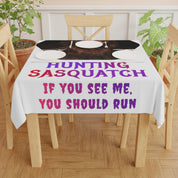 Tablecloth with "HUNTING SASQUATCH IF YOU SEE ME, YOU SHOULD RUN" text.