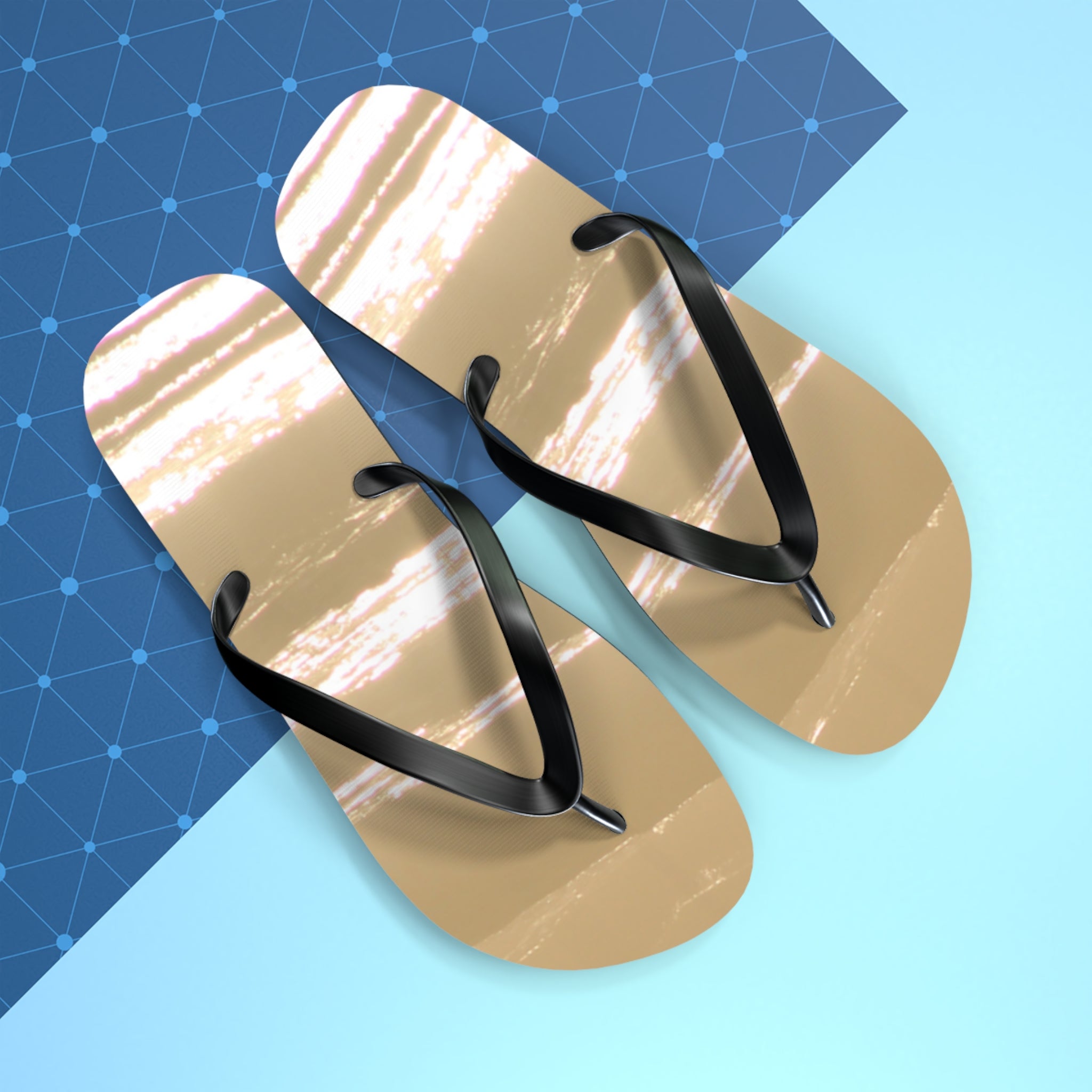 Brown and white striped flip-flops with black straps on a blue background.