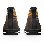 High-top canvas shoes with a sunset cloud print on the back.