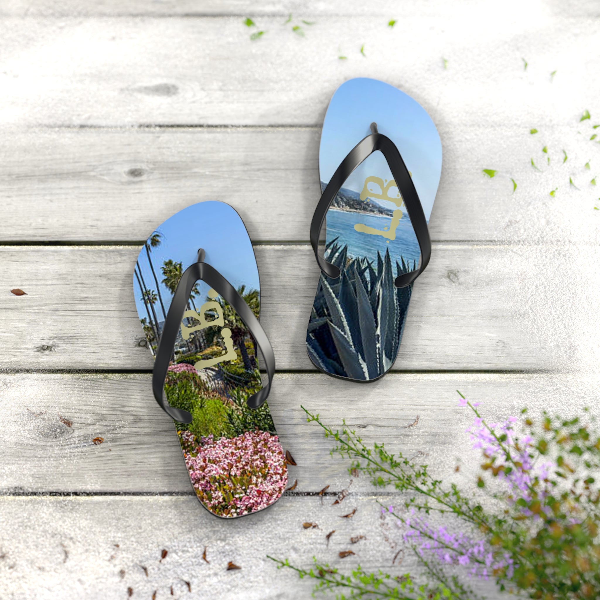 Flip-flops with beach and floral scenes, featuring "LB" logo.