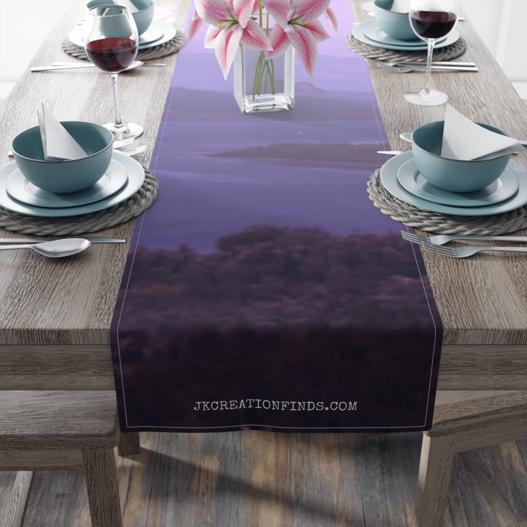 Table runner with purple landscape and JKCREATIONFINDS.COM text.
