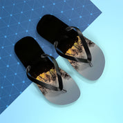 Black flip-flops with a sunset tree reflection on the straps.