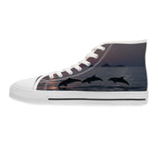 White high-top sneaker with leaping dolphins against a sunset ocean scene.