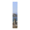 Tall, narrow artwork showing a rocky coastline with waves and dry grass.