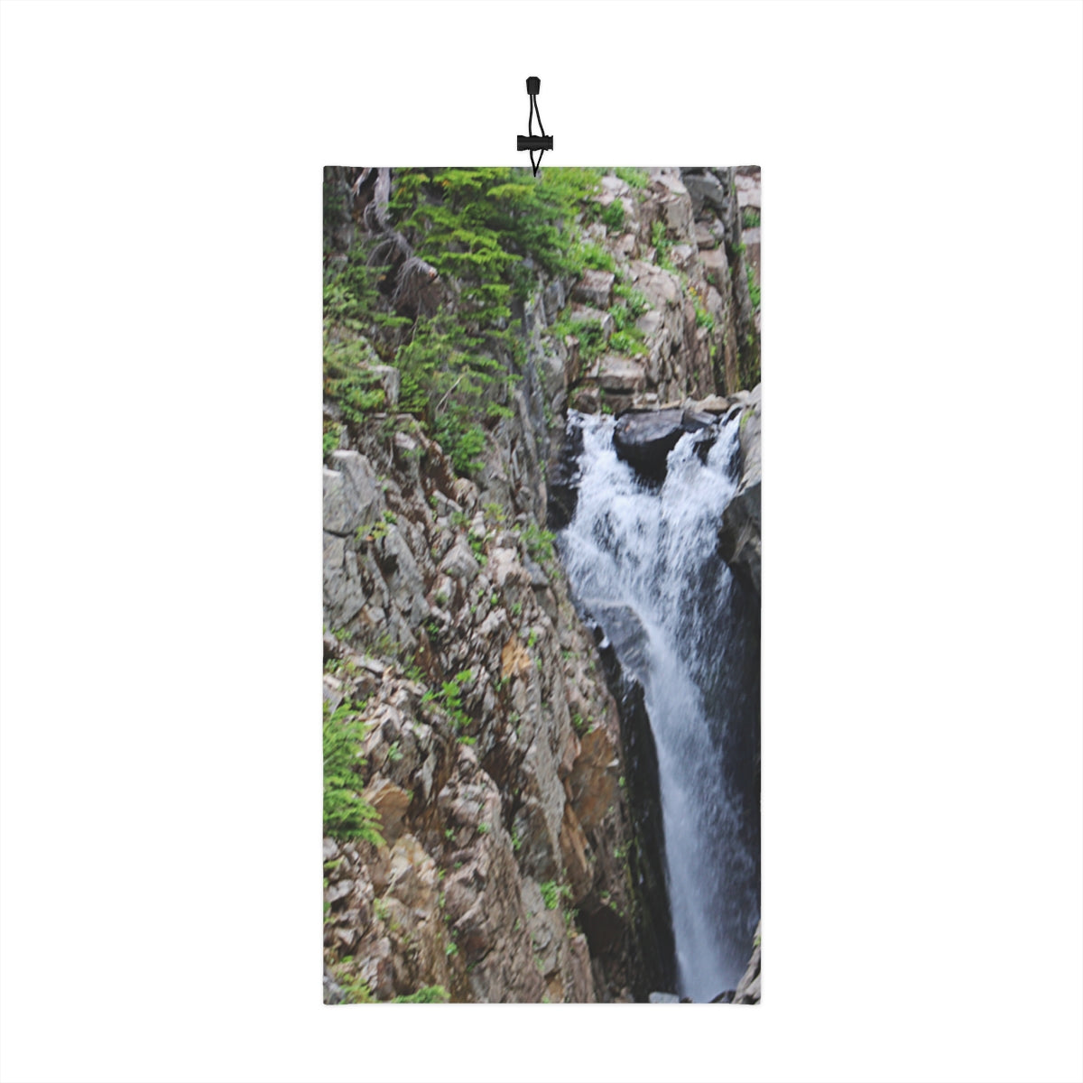 Majestic Waterfall Surrounded by Rocky Landscape Poster