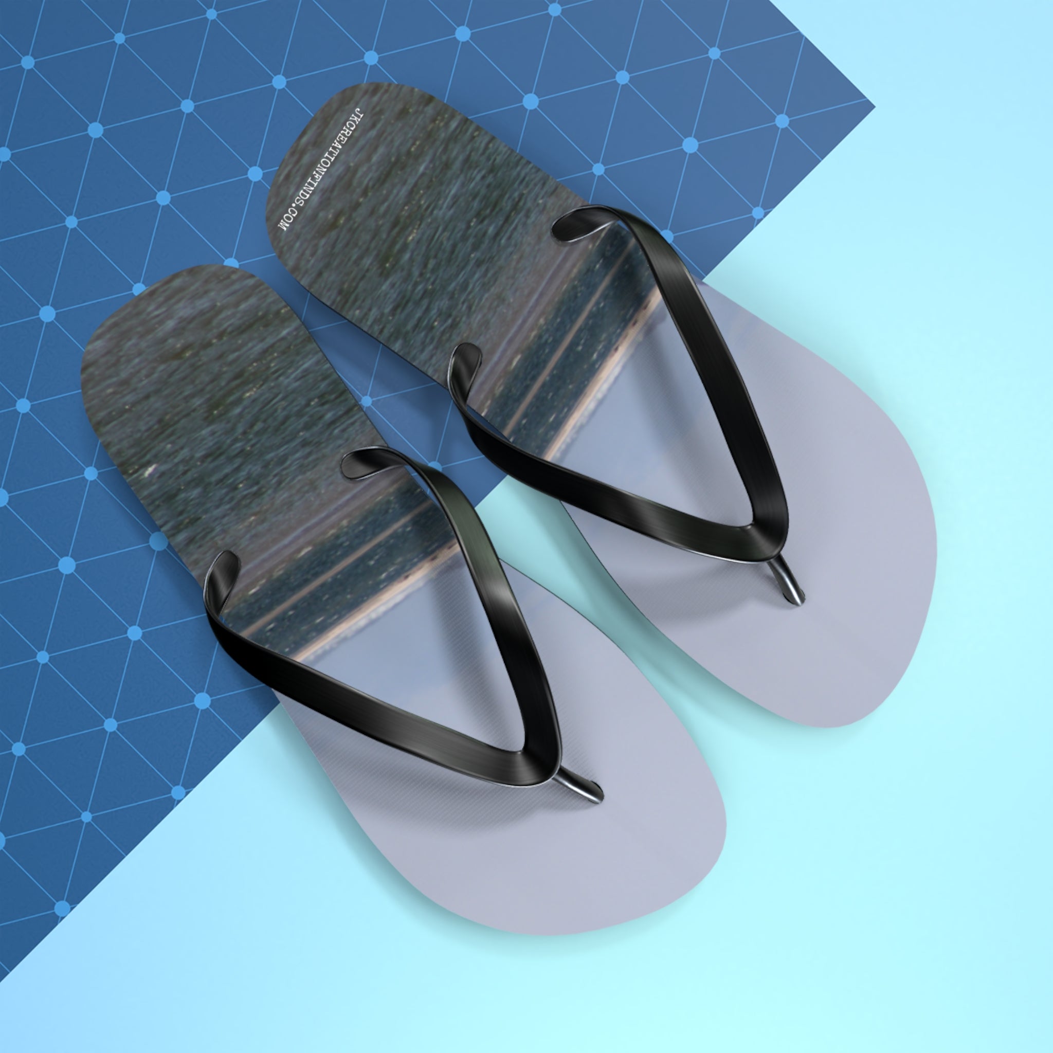 Flip-flops with a water scene and "HOMETOWNTHROUGH" text.