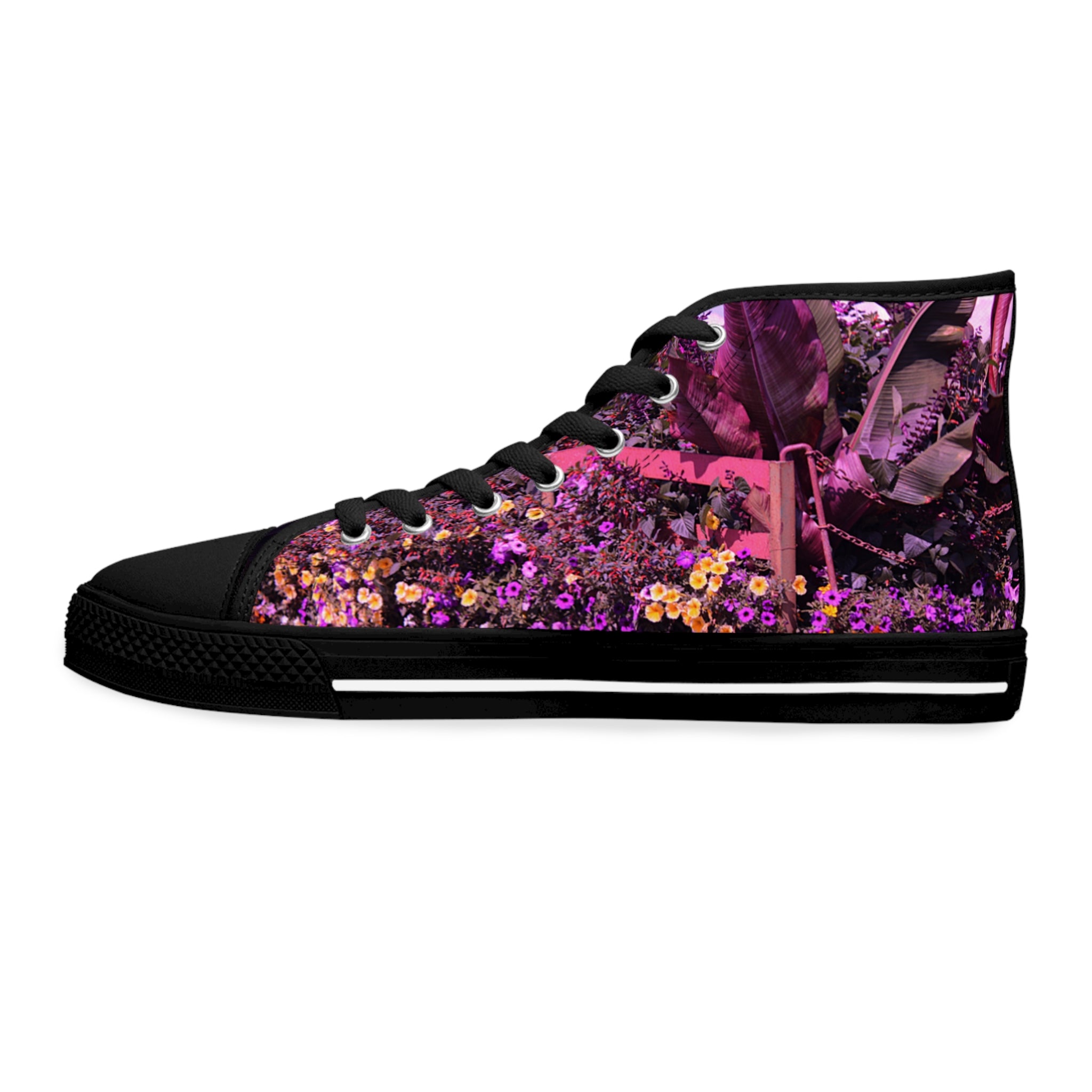 Black high-top sneakers with a vibrant floral and tropical leaf pattern.