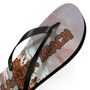 Flip-flops with "LAGUNA BEACH" text and a sandy ocean scene.