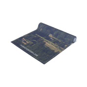 Rolled yoga mat with a forest scene and JKCREATIONFINDS.COM