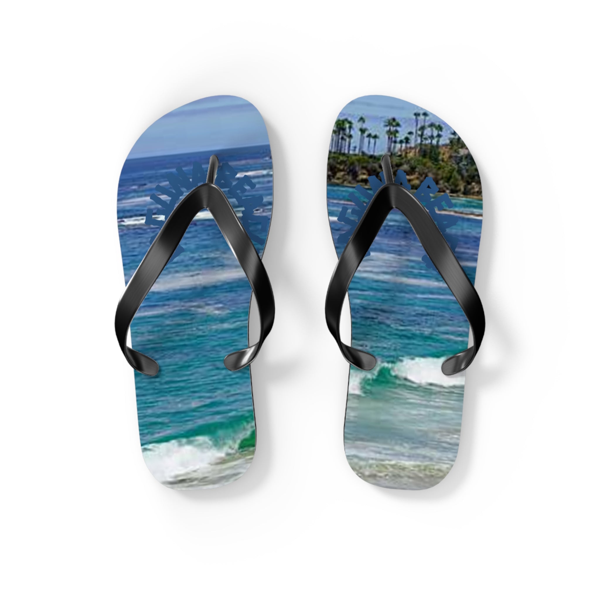 Flip flops with a beach scene and palm trees printed on the soles.