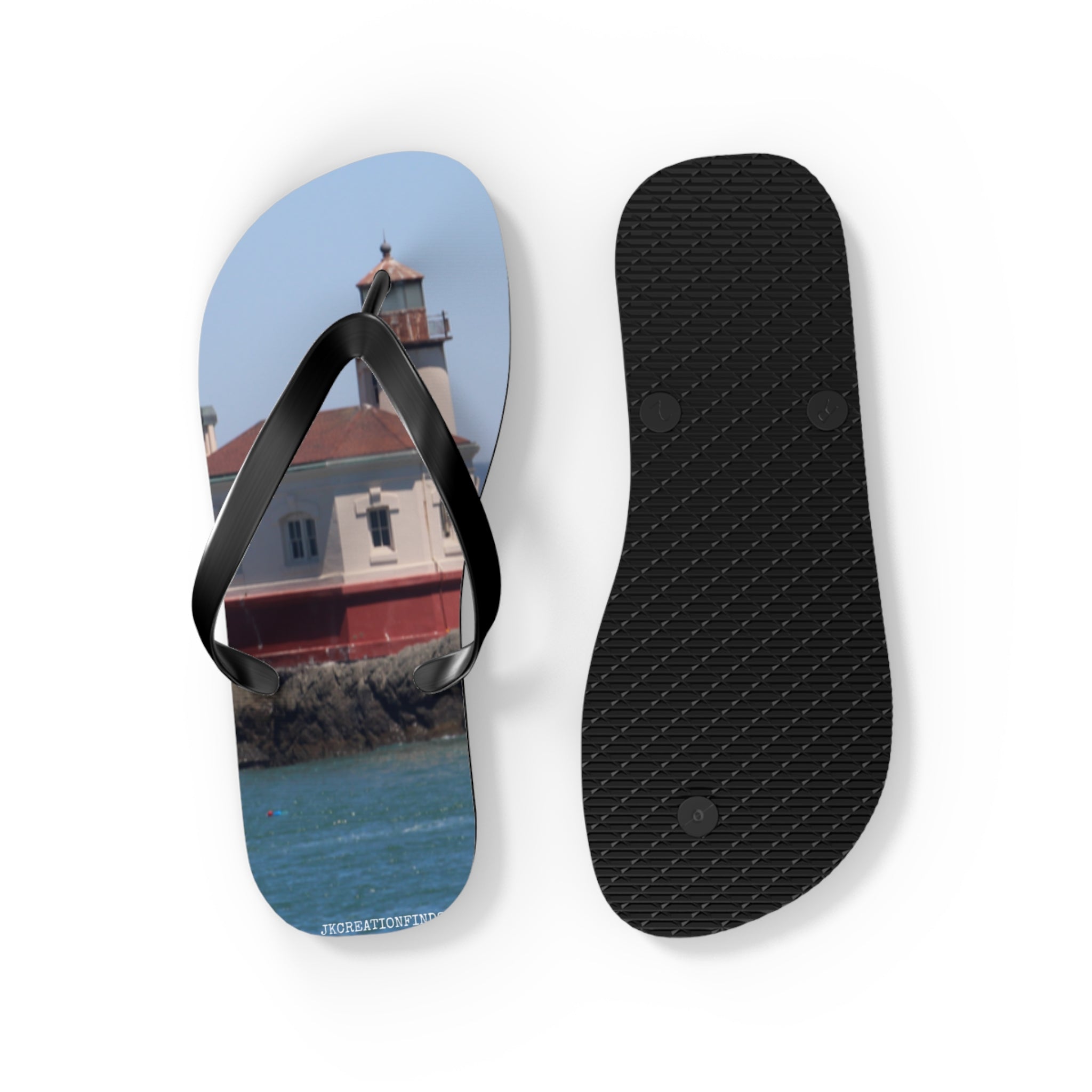 Flip-flops with a lighthouse on the left, textured sole on the right.