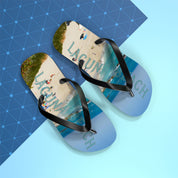 Flip-flops with "Laguna Beach" text on a blue grid background.