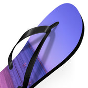 Flip-flop with a beach scene graphic and purple and pink sky.
