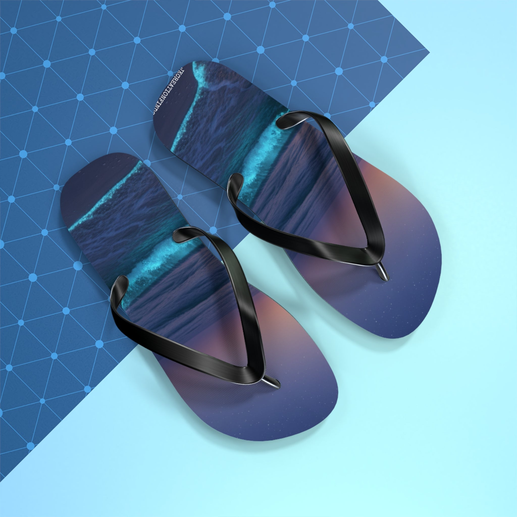 Flip-flops with a wave pattern and black straps on a blue background.