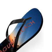 Flip-flops with "LAGUNA BEACH" text over a sunset sky.