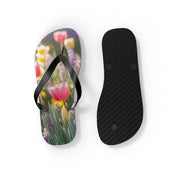 Flip-flops with a pink tulip and floral pattern.
