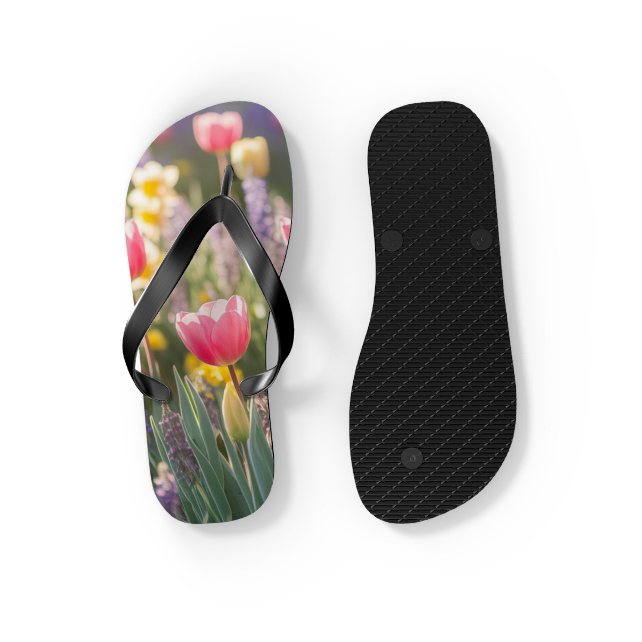 Flip-flops with a pink tulip and floral pattern.
