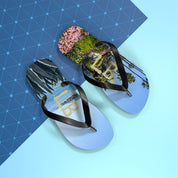 Flip-flops with beach and palm tree scenes, textured background.