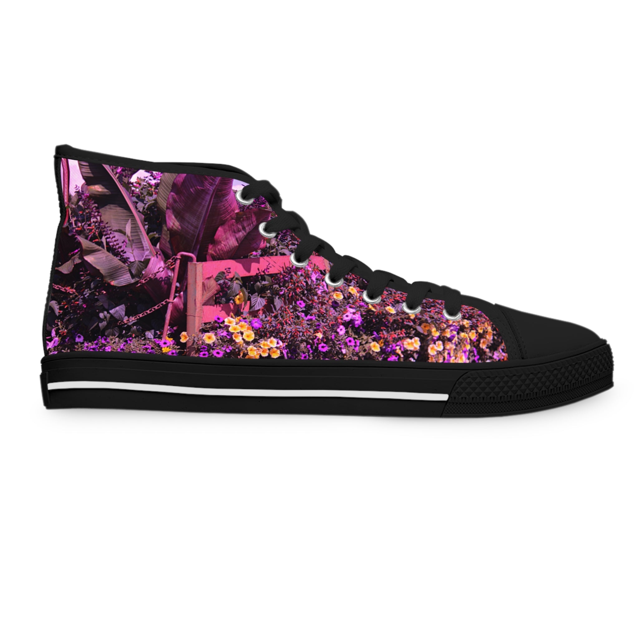 Black high-top sneaker with a floral pattern of pink and yellow flowers.