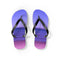 Flip-flops with a beach scene featuring people in the water.