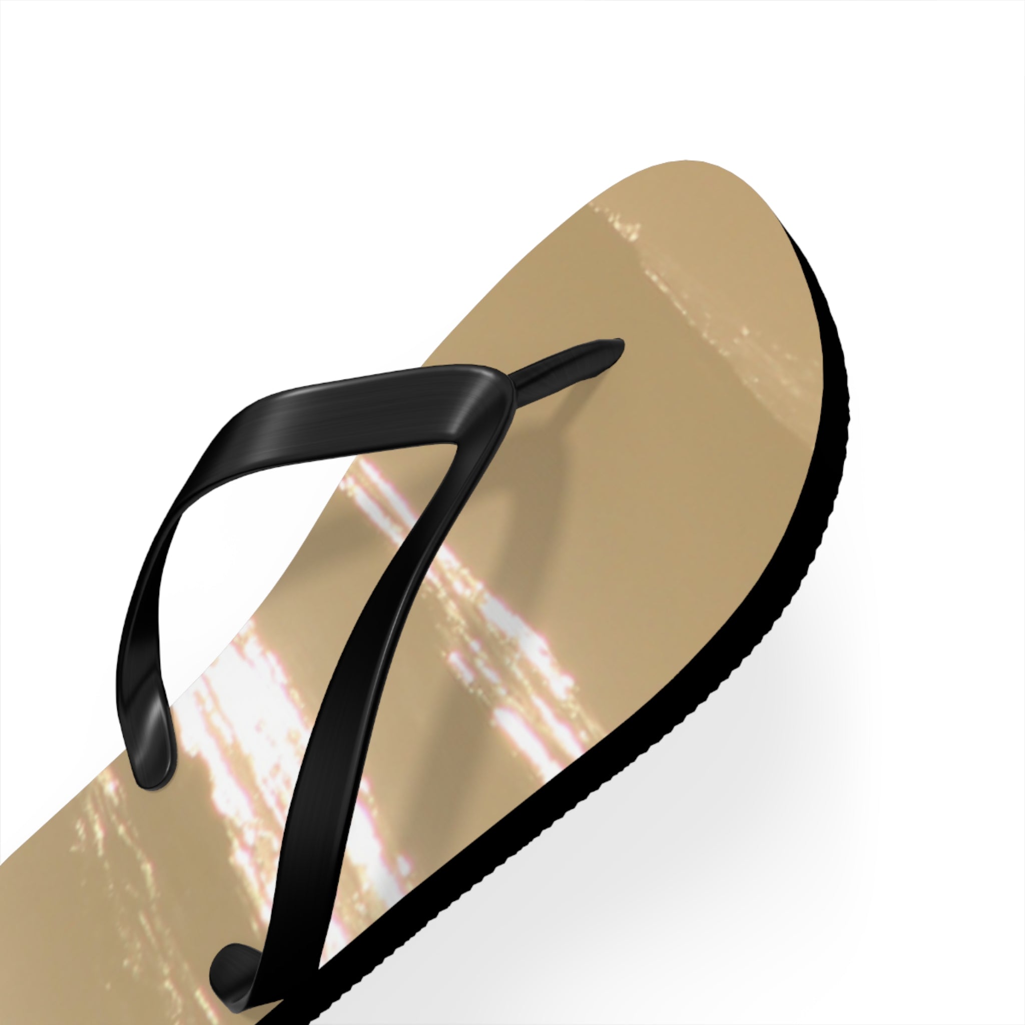 Golden flip-flop with black strap against a white background.