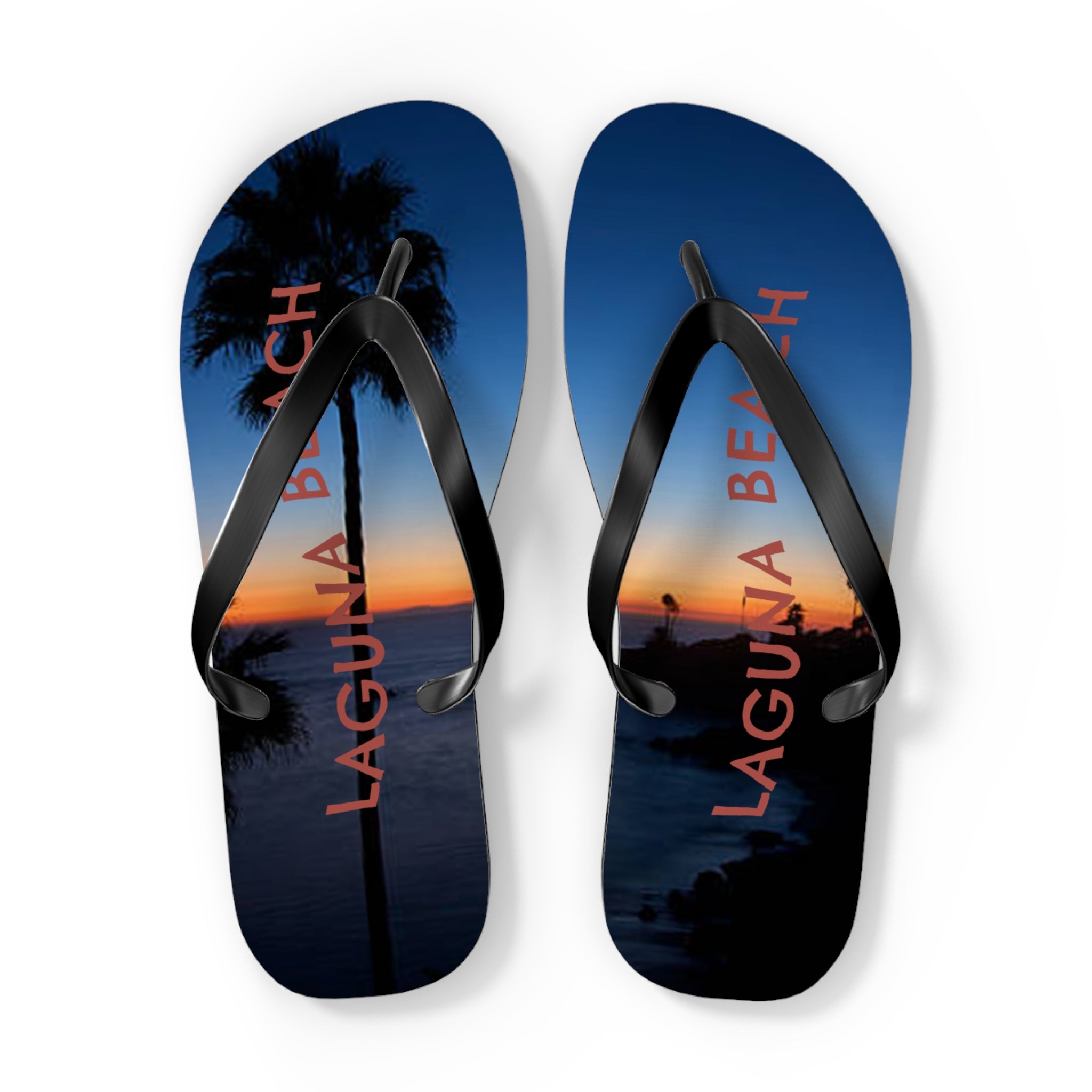 Laguna Beach flip-flops with palm tree and sunset scene.
