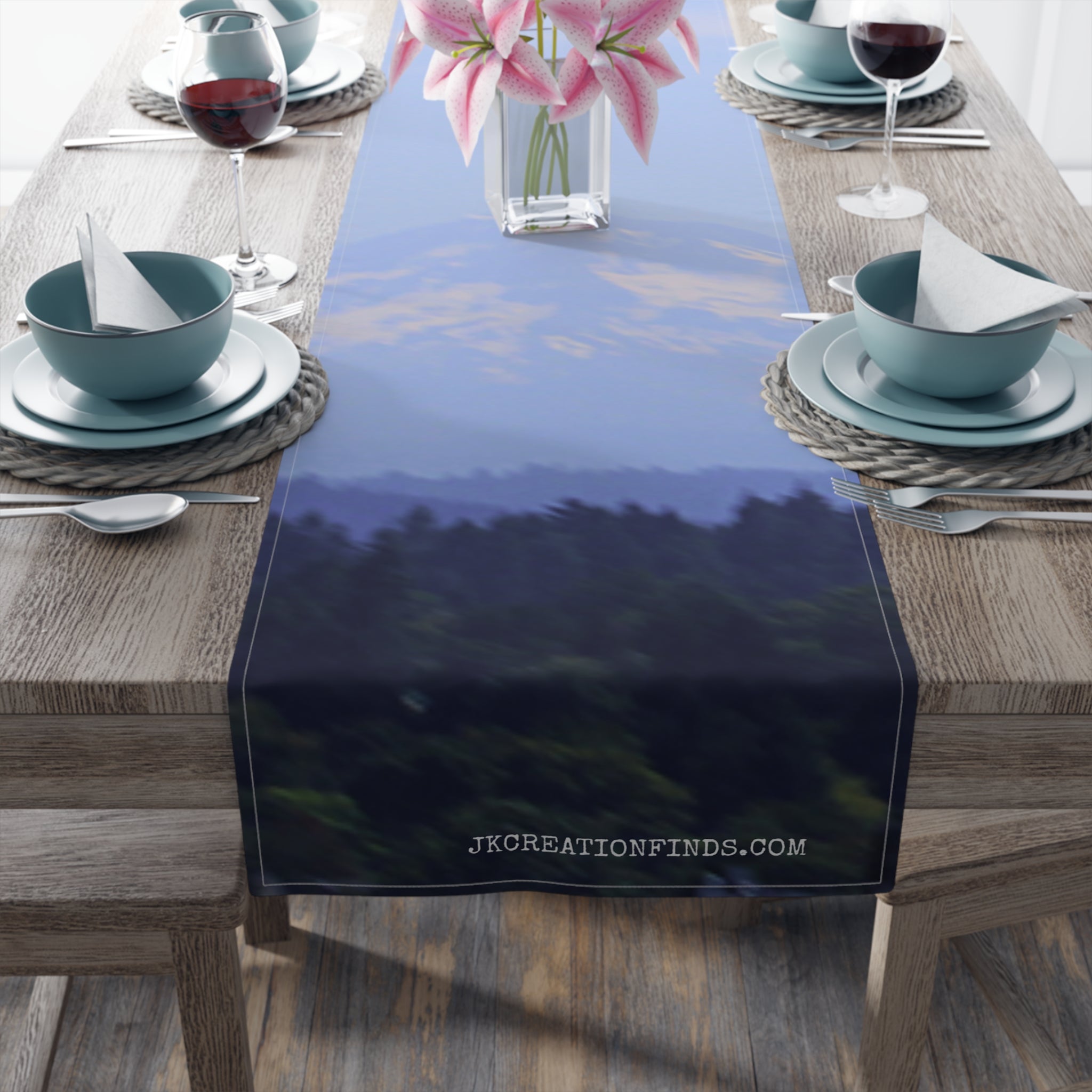 Blue misty mountain landscape on a fabric table runner.