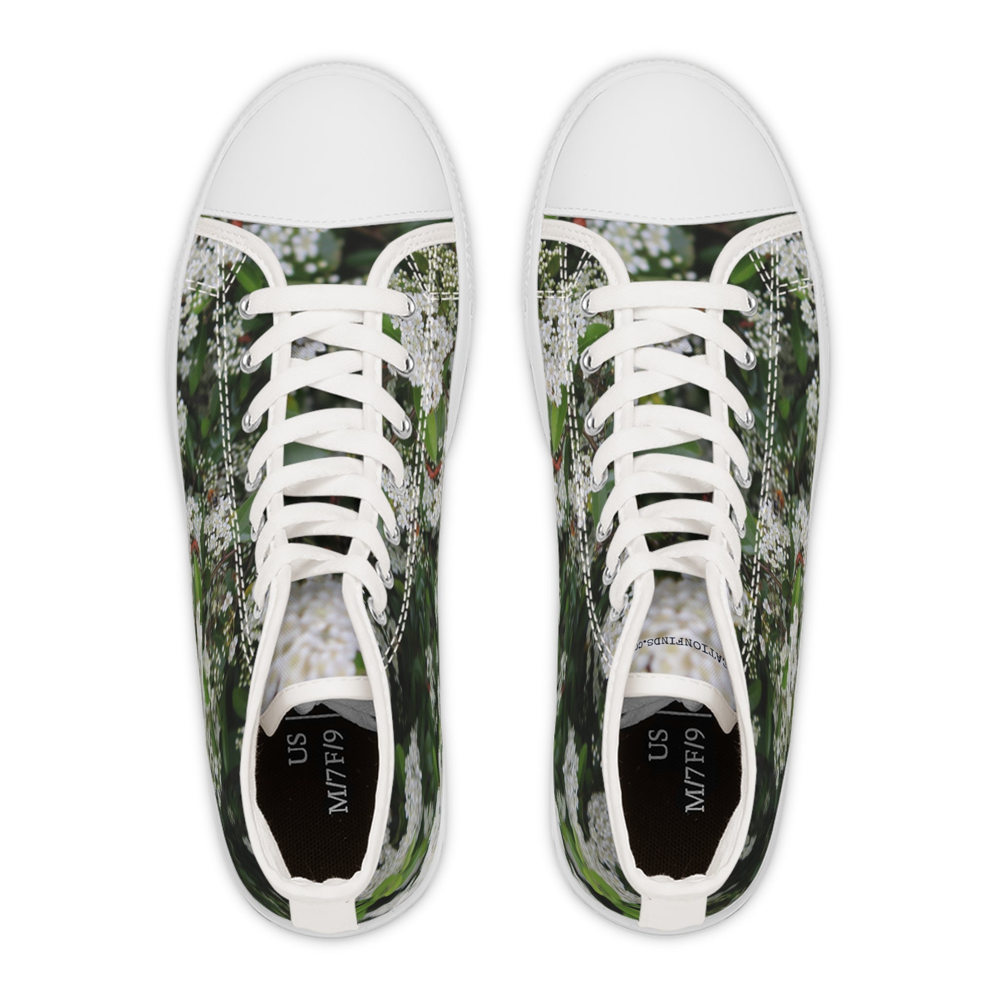 White high-top canvas sneakers with a floral print.