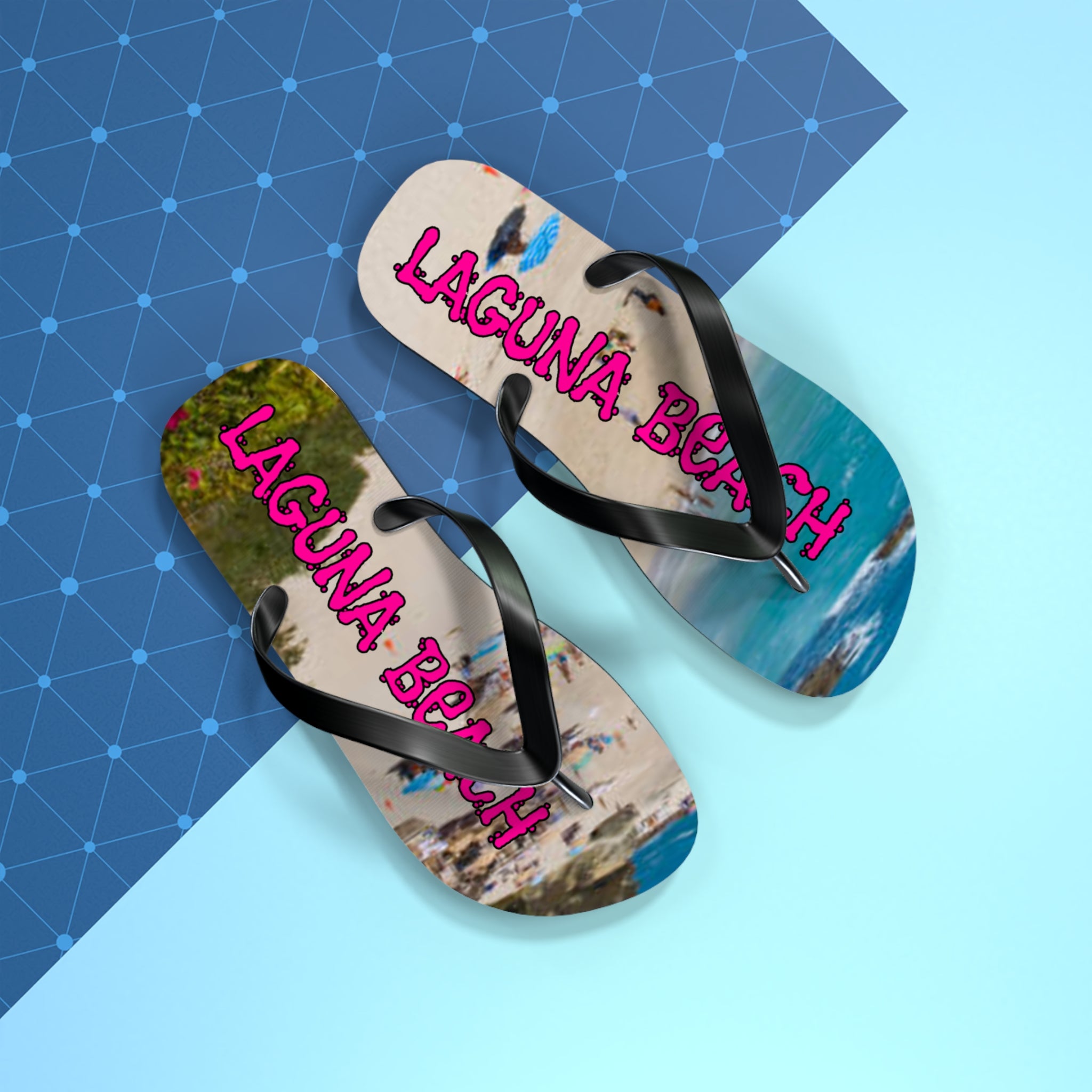Black flip-flops with "LAGUNA BEACH" text on a beach scene.