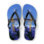 Flip-flops with "LAGUNA BEACH" text and a serene moonlit coastal scene.