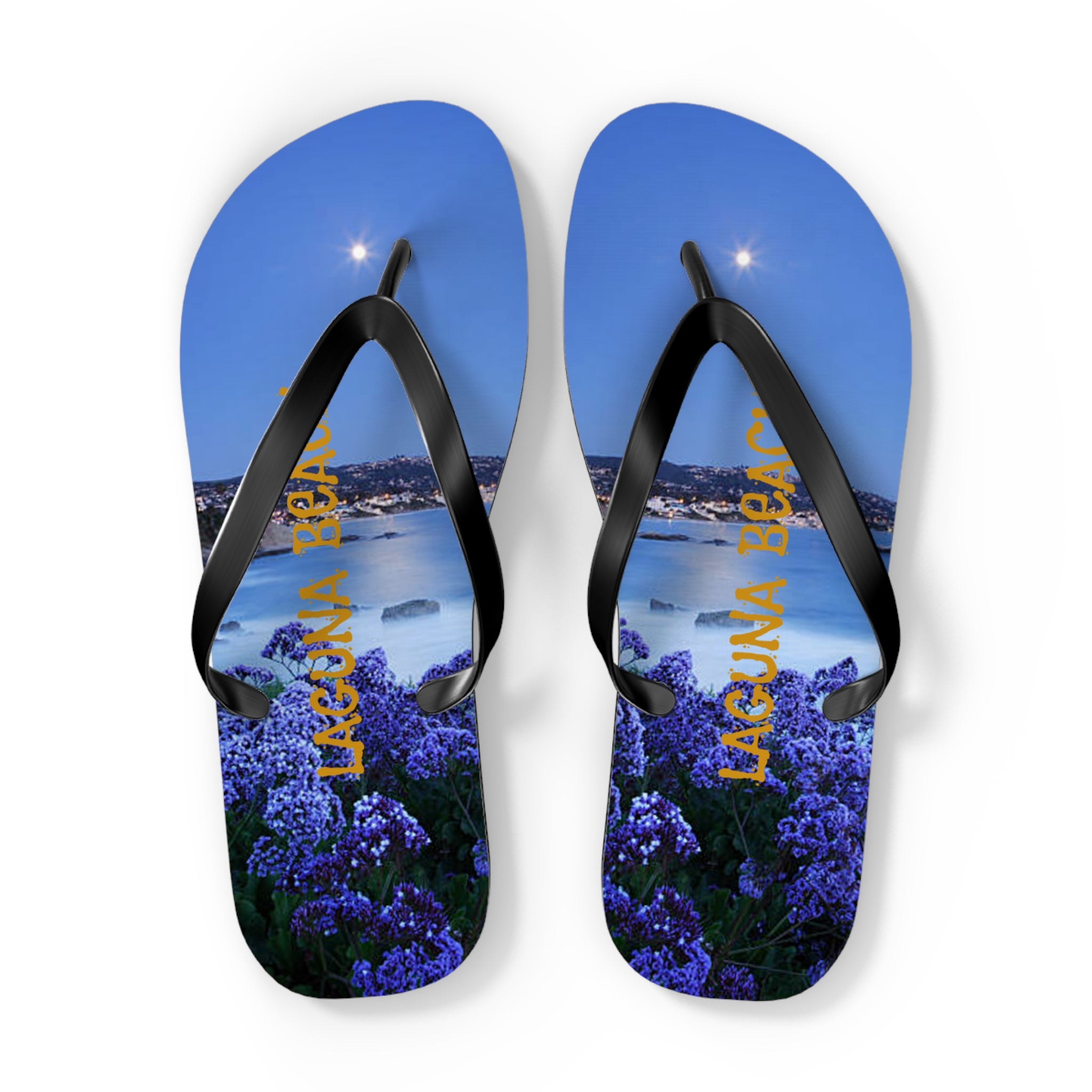 Flip-flops with "LAGUNA BEACH" text and a serene moonlit coastal scene.