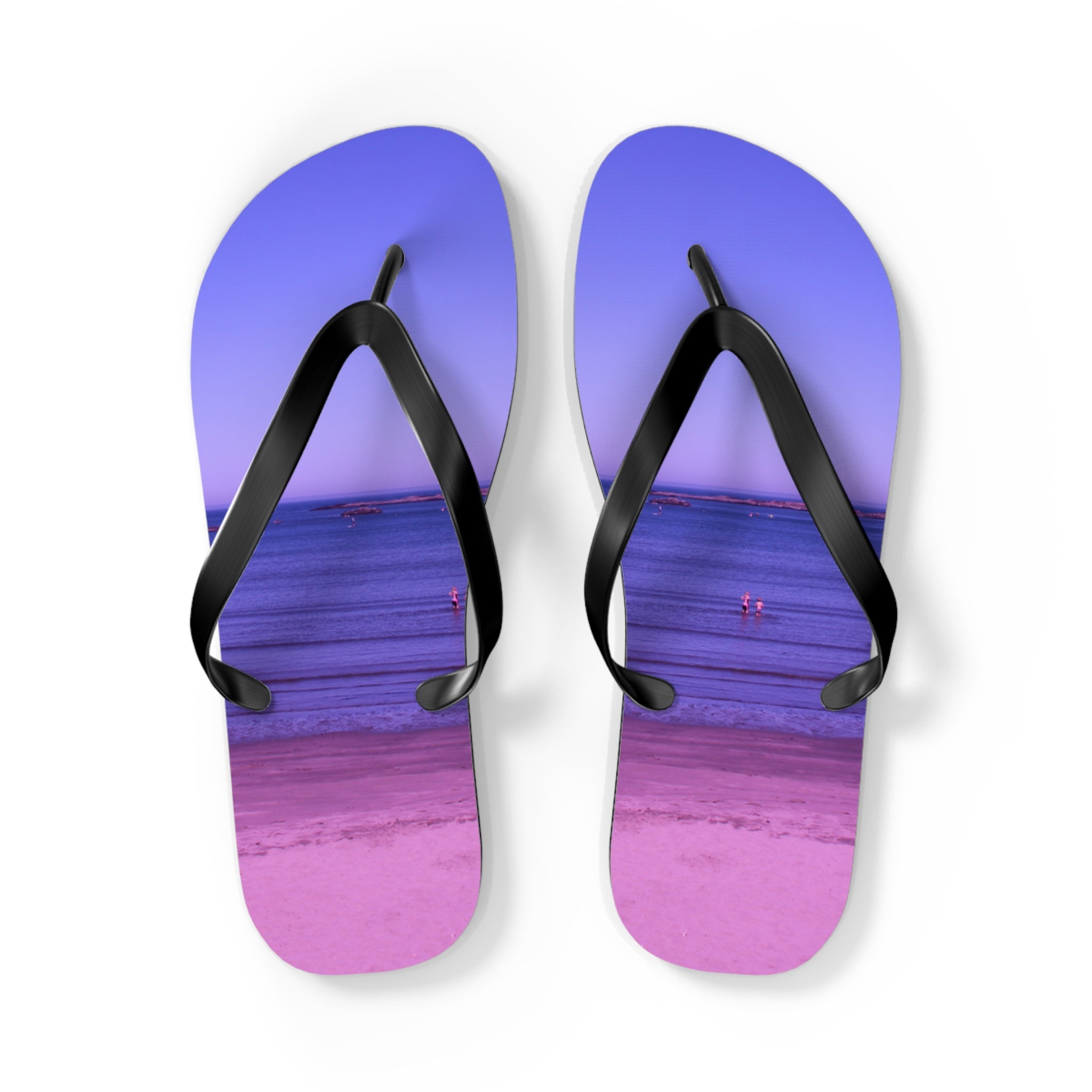 Purple flip-flops with a beach scene and water reflection on the soles.