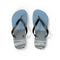 Blue flip-flops with a beach scene printed on the soles.