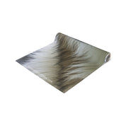 Rolled-up yoga mat with close-up faux fur texture and website URL.