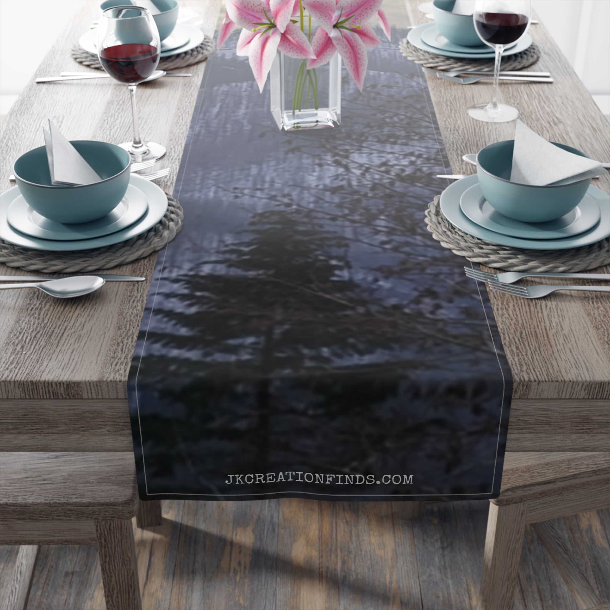 Dark forest scene with JKCREATIONFIND.COM watermark on a fabric table runner.