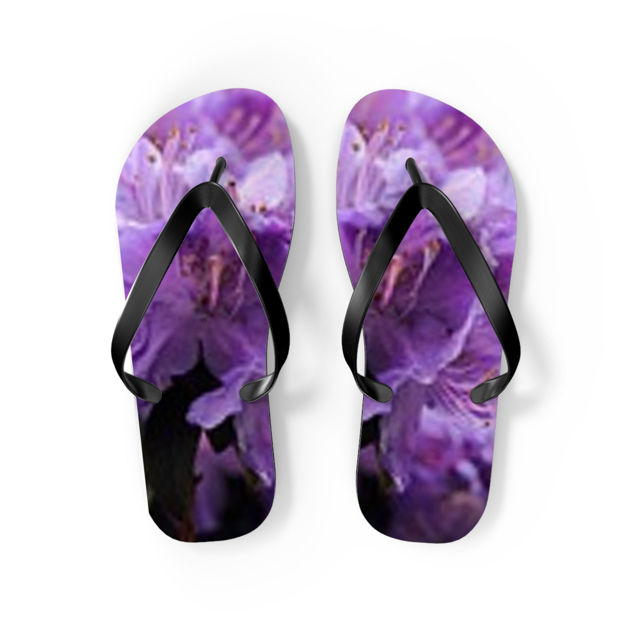 Flip-flops with a close-up floral print of purple flowers.