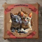 Two kittens peeking through ripped paper, with "FRIENDSHIP IS FOREVER" text.