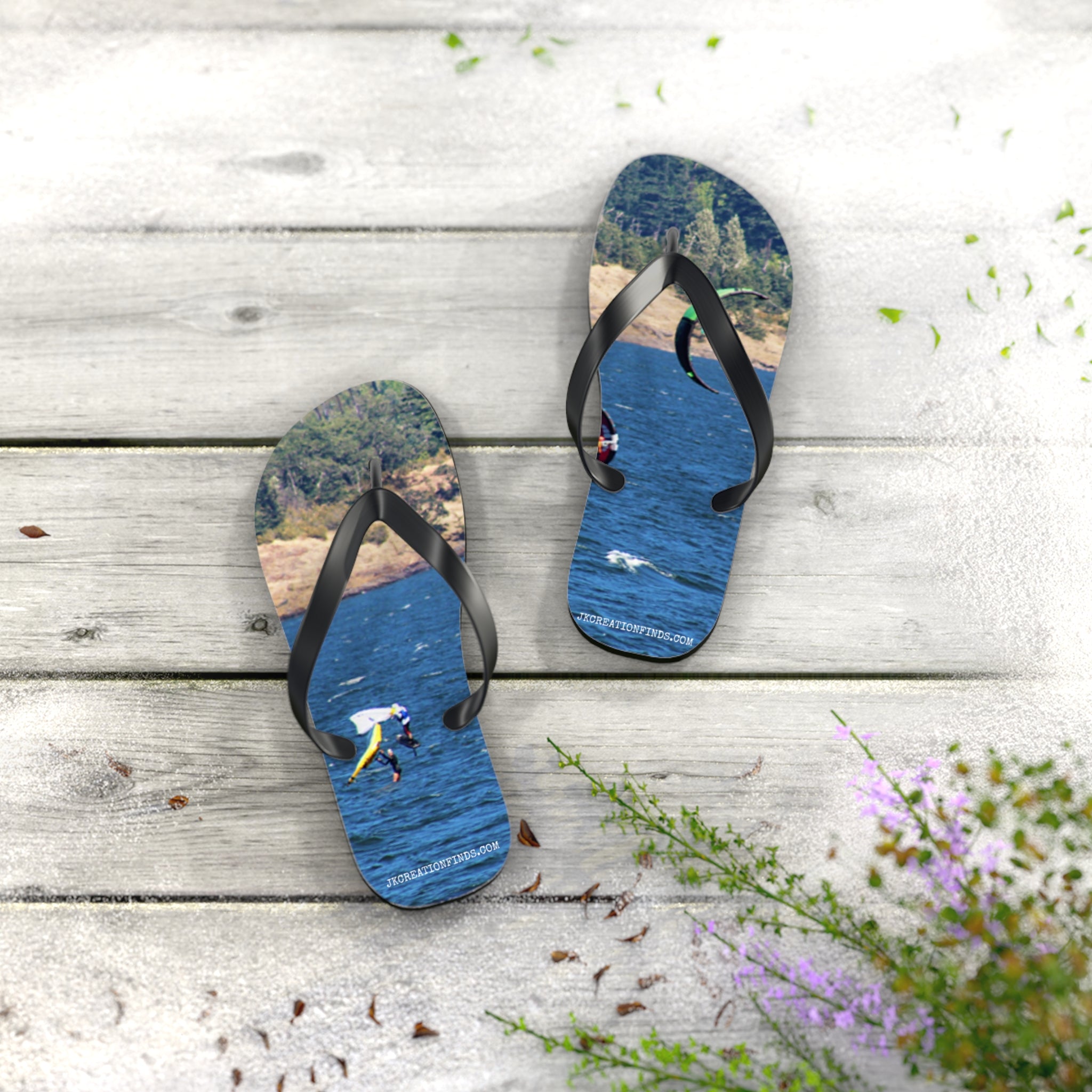Flip flops with wakeboarders on a lake.