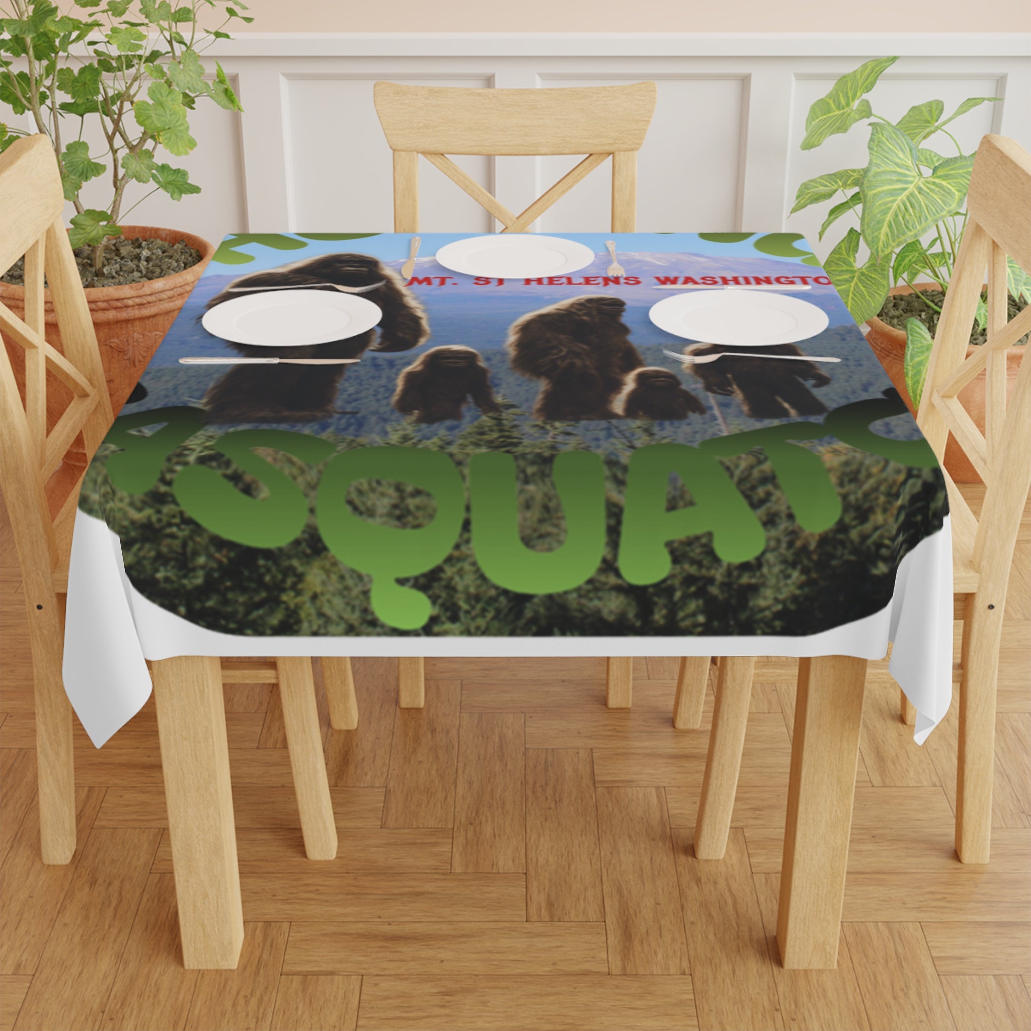Tablecloth with "SQUATCH" text and Mount St. Helens graphic.