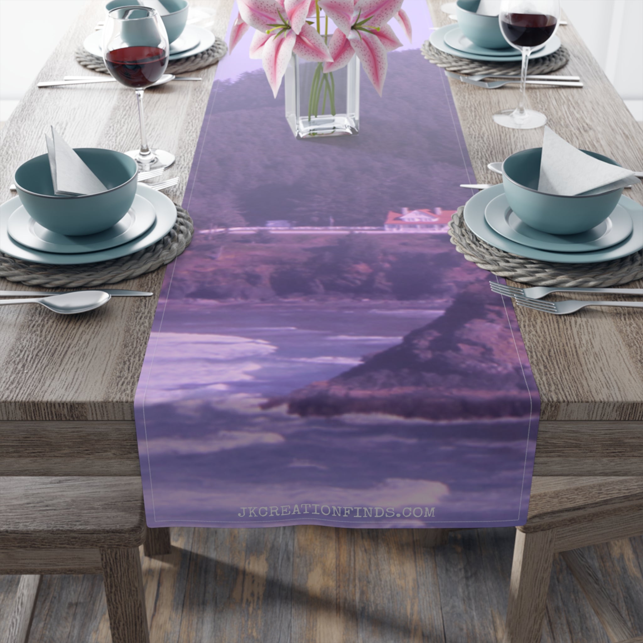 Purple abstract landscape scene with pink flowers and a winery on a table runner.