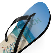 Flip-flops with "Laguna Beach" text and aerial view of beach.