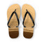 Two flip-flops with ocean wave pattern on soles.