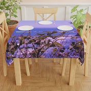 Tablecloth with a close-up view of purple ocean water and green leaves.