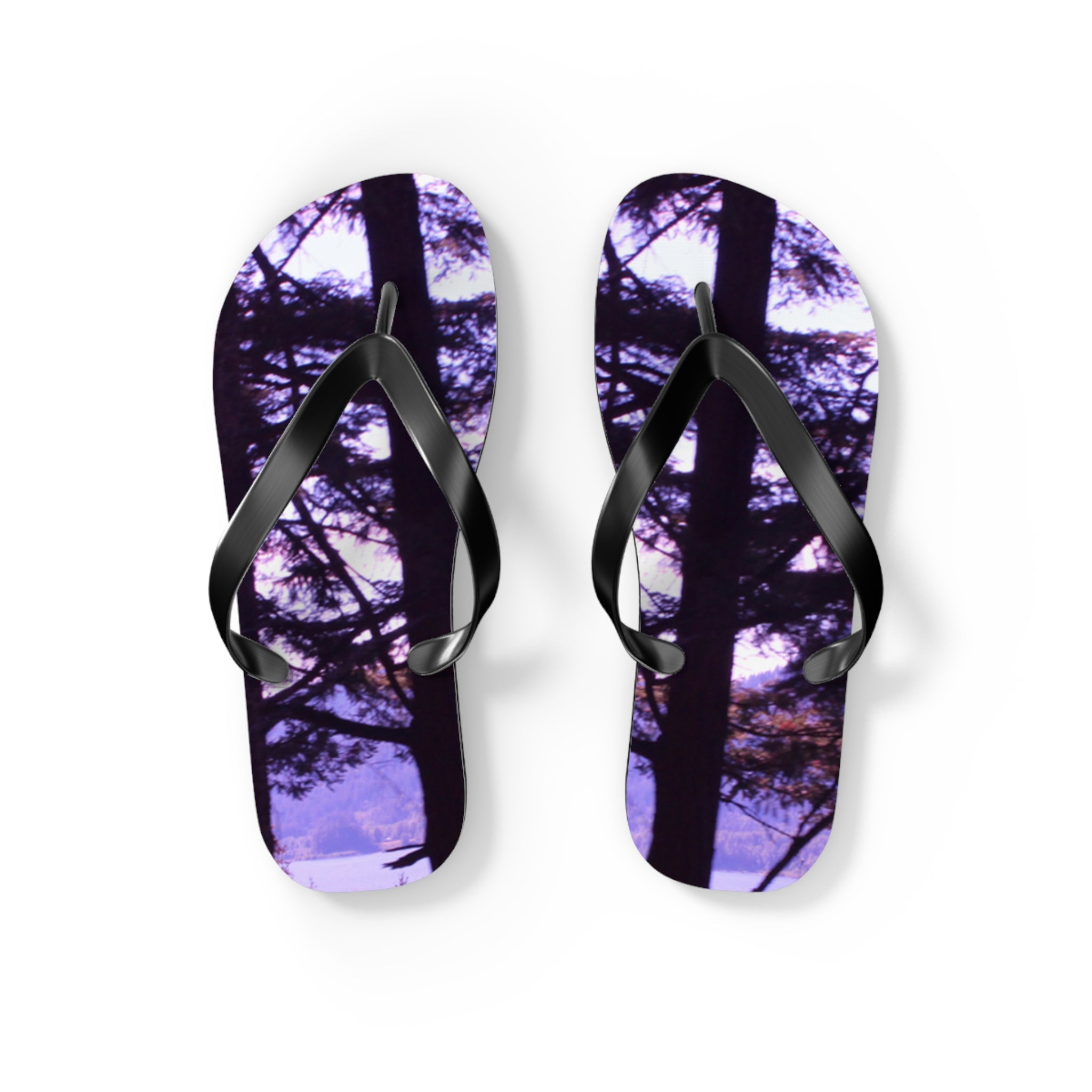 Flip-flops with a forest and lake scene.