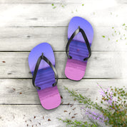 Purple and pink ombre flip-flops with beach scene on wooden planks.