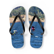 Flip-flops with kitesurfing scene and website address.